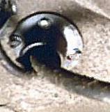 The vent pipe exits the floor of the vehicle and is designed to dump any escaped gas overboard